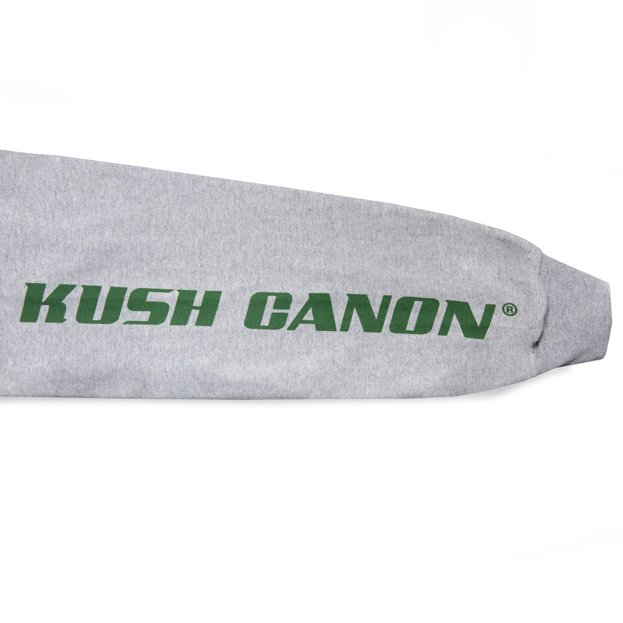 Close-up view of sleeve graphic print of Made in Paradise World Drug Trade Collection "KUSH CANON" sport grey long sleeve t-shirt