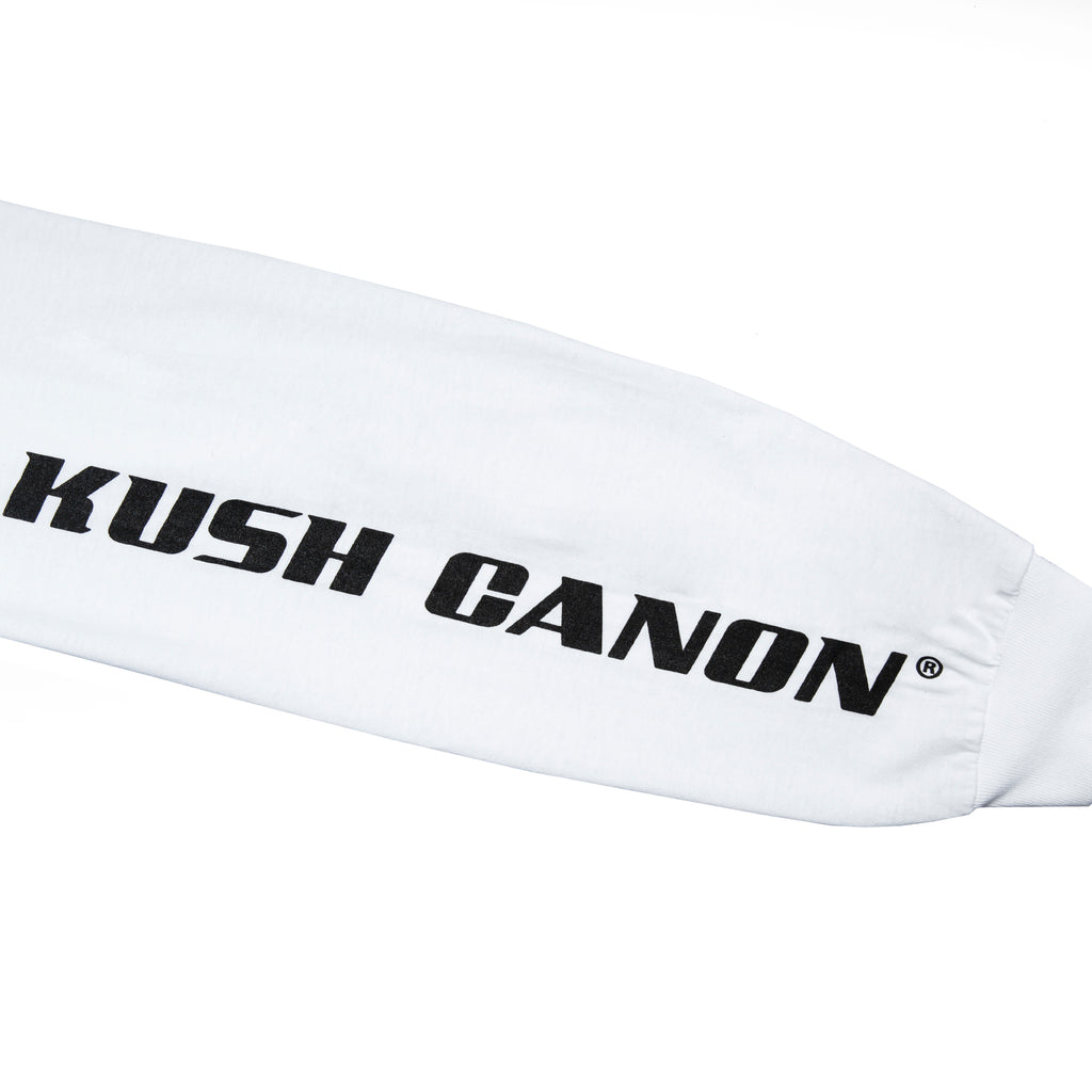 Close-up view of sleeve graphic print of Made in Paradise World Drug Trade Collection "KUSH CANON" white long sleeve t-shirt