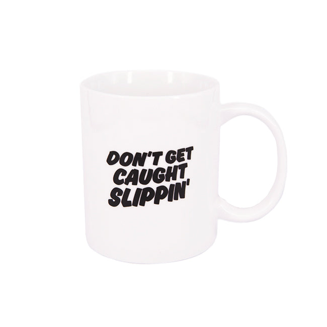 Front view of Made in Paradise Home & Lifestyle Goods Collection "Slippin" coffee mug