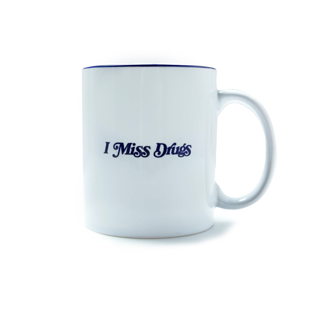 Front view of Made in Paradise Home & Lifestyle Goods Collection "I Miss Drugs" coffee mug