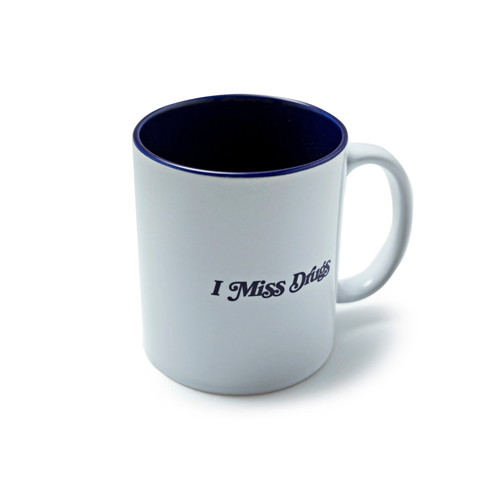 Profile view of Made in Paradise Home & Lifestyle Goods Collection "I Miss Drugs" coffee mug